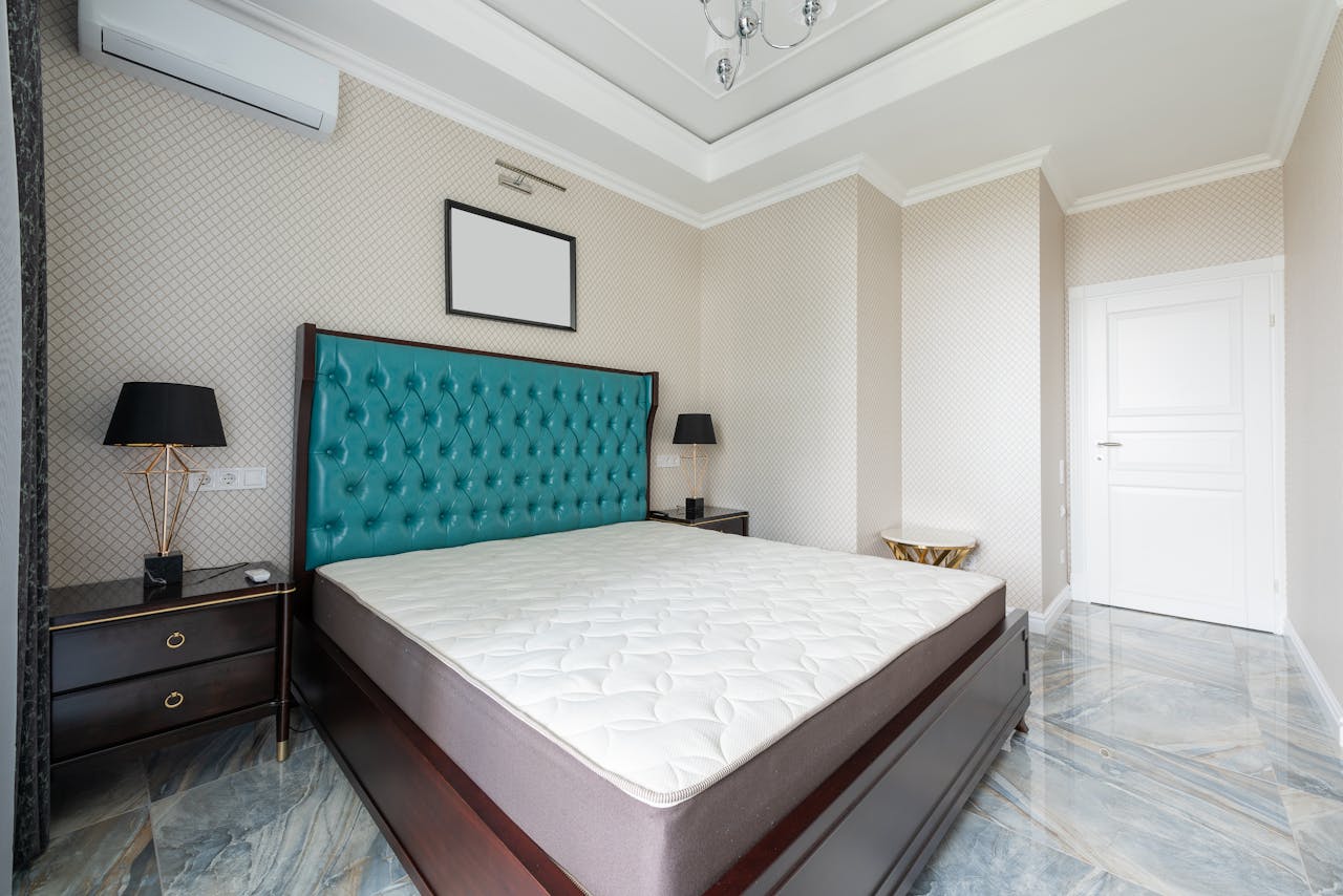Contemporary bedroom interior with furniture on marble floor